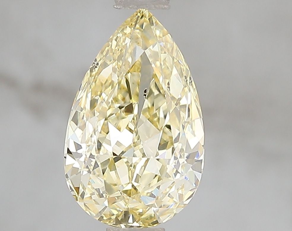 Loose Diamond - PEAR 2.01ct Fancy Intense Yellow SI1: Loose Diamond - PEAR 2.01ct Fancy Intense Yellow SI1 Source: This is a real non-mined Diamond that has been grown in a lab Shape: PEAR Carats: 2.01 Color: Fancy Intense Yellow Certification: IGI Video
