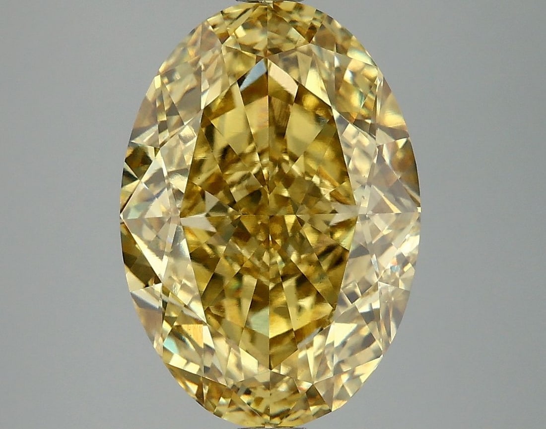 Loose Diamond - OVAL 6.09ct Fancy Vivid Yellow VS1: Loose Diamond - OVAL 6.09ct Fancy Vivid Yellow VS1 Source: This is a real non-mined Diamond that has been grown in a lab Shape: OVAL Carats: 6.09 Color: Fancy Vivid Yellow Certification: IGI Video: