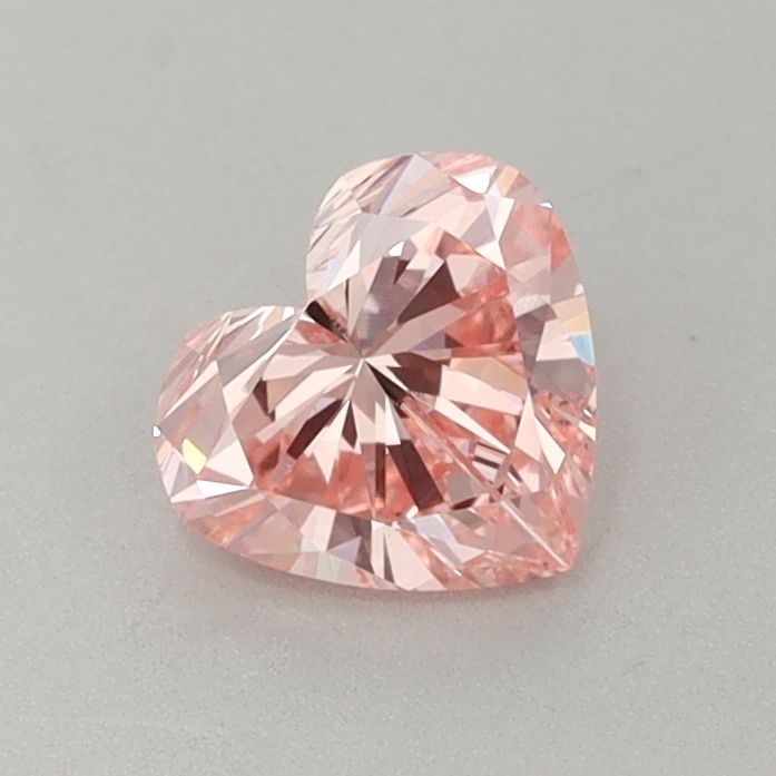 Loose Diamond - HEART 0.71ct Fancy Vivid Pink VS1: Loose Diamond - HEART 0.71ct Fancy Vivid Pink VS1 Source: This is a real non-mined Diamond that has been grown in a lab Shape: HEART Carats: 0.71 Color: Fancy Vivid Pink Certification: IGI Video: