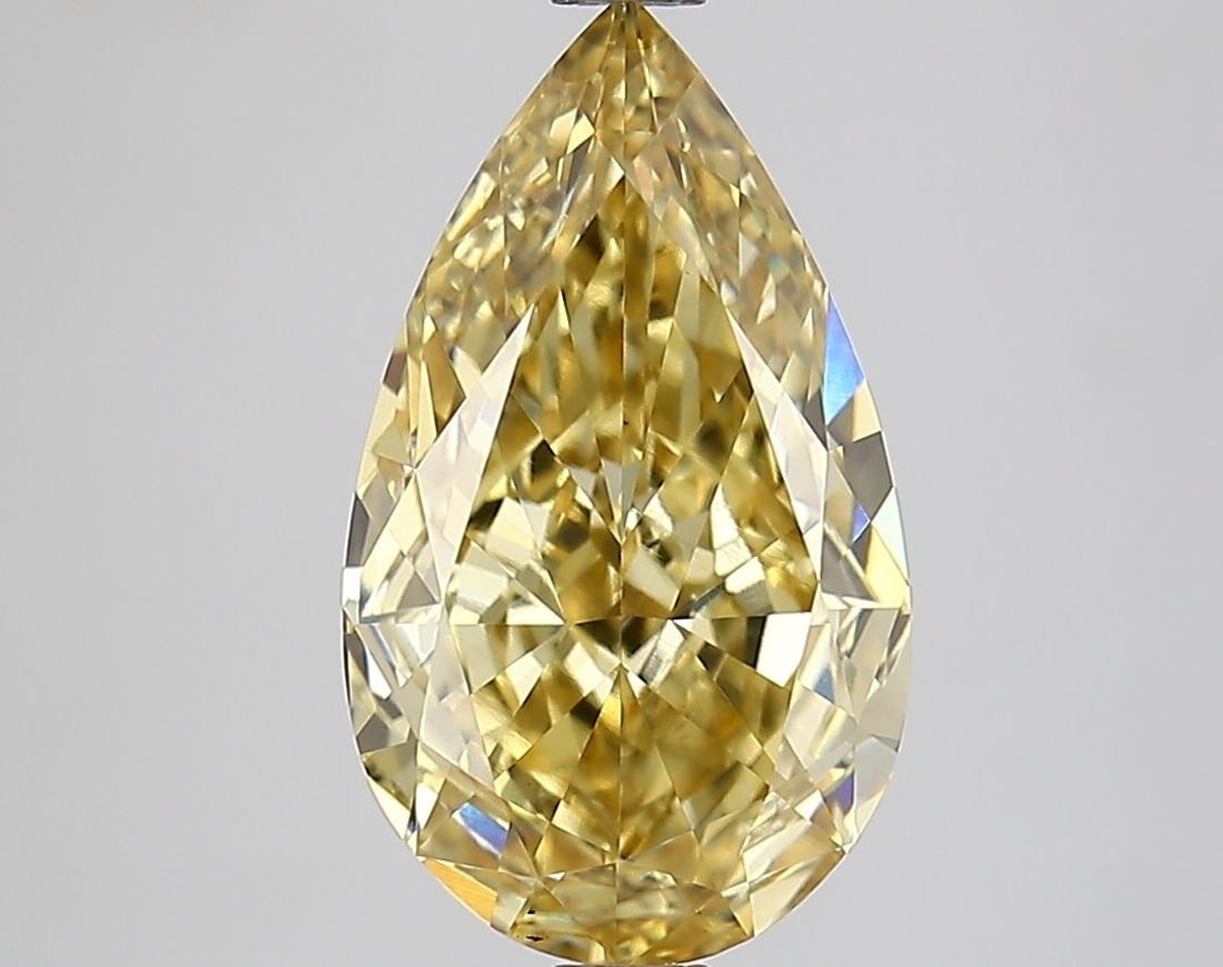 Loose Diamond - PEAR 3.02ct Fancy Vivid Yellow VS1: Loose Diamond - PEAR 3.02ct Fancy Vivid Yellow VS1 Source: This is a real non-mined Diamond that has been grown in a lab Shape: PEAR Carats: 3.02 Color: Fancy Vivid Yellow Certification: IGI Video: