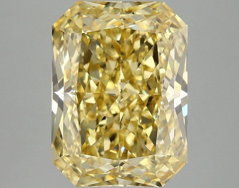 Loose Diamond - RADIANT 4.1ct Fancy Vivid Yellow VS1: Loose Diamond - RADIANT 4.1ct Fancy Vivid Yellow VS1 Source: This is a real non-mined Diamond that has been grown in a lab Shape: RADIANT Carats: 4.1 Color: Fancy Vivid Yellow Certification: IGI Video