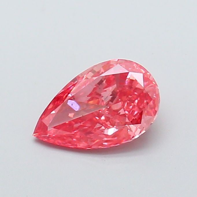 Loose Diamond - PEAR 1.0ct Fancy Vivid Pink SI1: Loose Diamond - PEAR 1.0ct Fancy Vivid Pink SI1 Source: This is a real non-mined Diamond that has been grown in a lab Shape: PEAR Carats: 1.0 Color: Fancy Vivid Pink Certification: IGI Video: