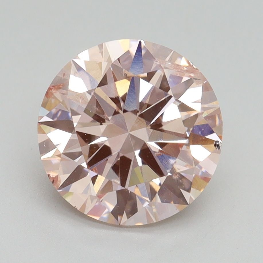 Loose Diamond - ROUND 2.5ct Fancy Light Pink SI2: Loose Diamond - ROUND 2.5ct Fancy Light Pink SI2 Source: This is a real non-mined Diamond that has been grown in a lab Shape: ROUND Carats: 2.5 Color: Fancy Light Pink Certification: IGI Video: