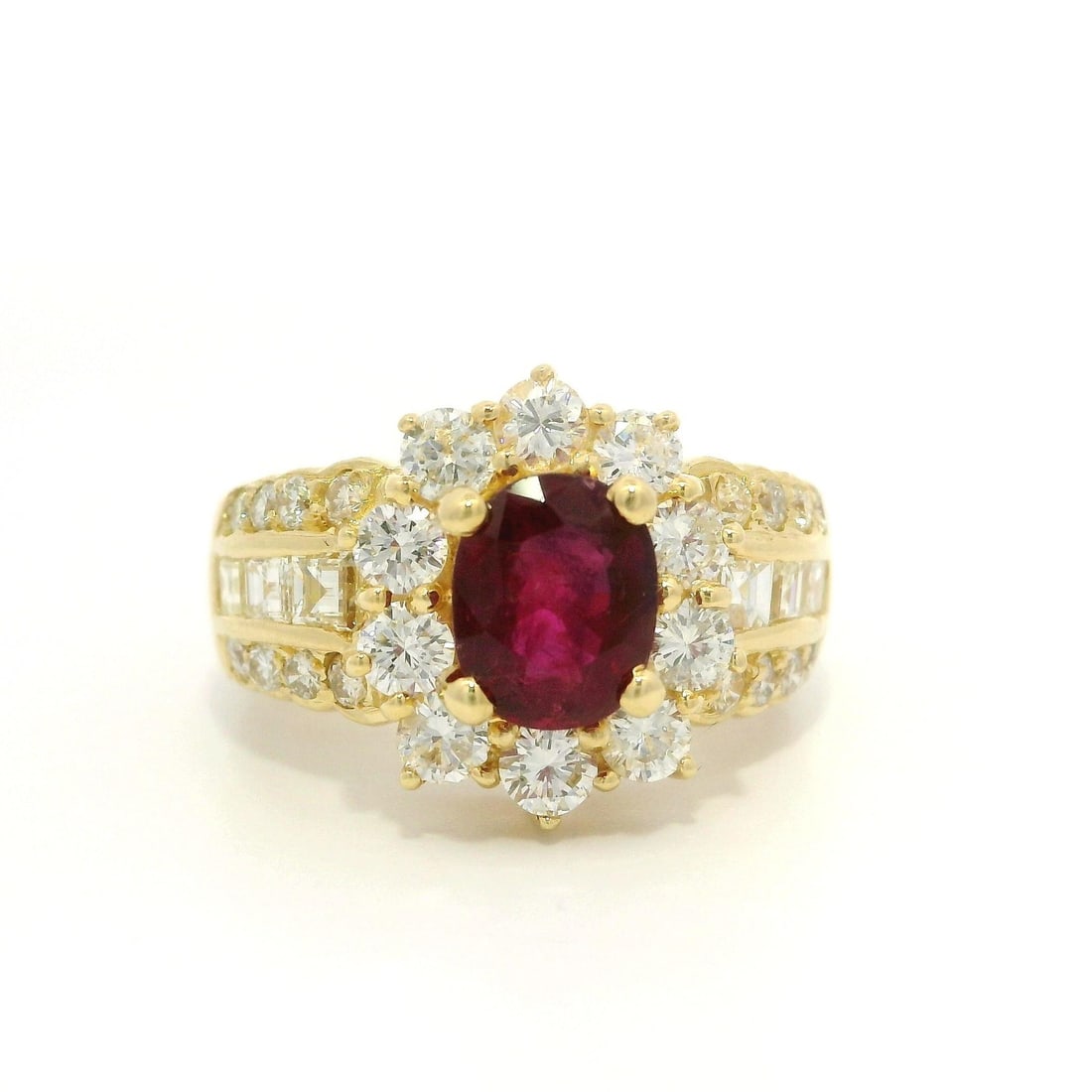 18k Gold GIA Certified 2.81ctw Oval Ruby Diamond Cocktail Ring: 18k Gold GIA Certified 2.81ctw Oval Ruby Diamond Cocktail Ring This exquisite cocktail ring features a stunning 1.39ct oval natural ruby, prong set to showcase its rich red color. Accompanied by 26 ba