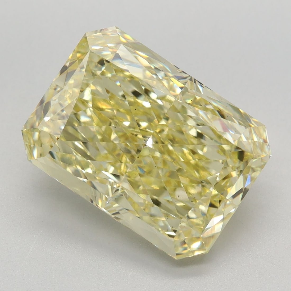 Loose Diamond - RADIANT 5.24ct Fancy Intense Yellow VS2: Loose Diamond - RADIANT 5.24ct Fancy Intense Yellow VS2 Source: This is a real non-mined Diamond that has been grown in a lab Shape: RADIANT Carats: 5.24 Color: Fancy Intense Yellow Certification: IGI
