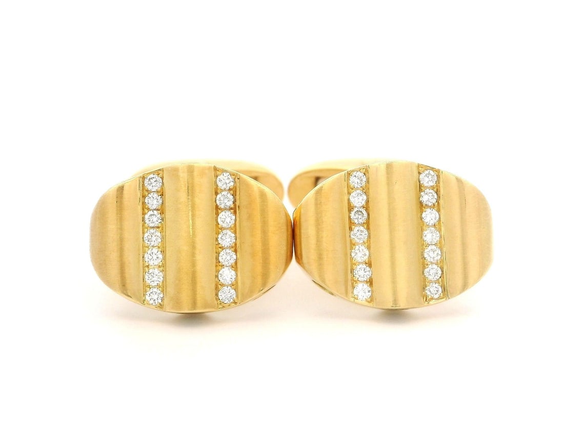 Victor Mayer 18k Yellow Gold Diamond 0.35ctw Wavy Cufflinks with Box: Victor Mayer 18k Yellow Gold Diamond 0.35ctw Wavy Cufflinks with Box Elevate your style with these exquisite Victor Mayer cufflinks, crafted in solid 18k yellow gold. Featuring 28 natural round brilli