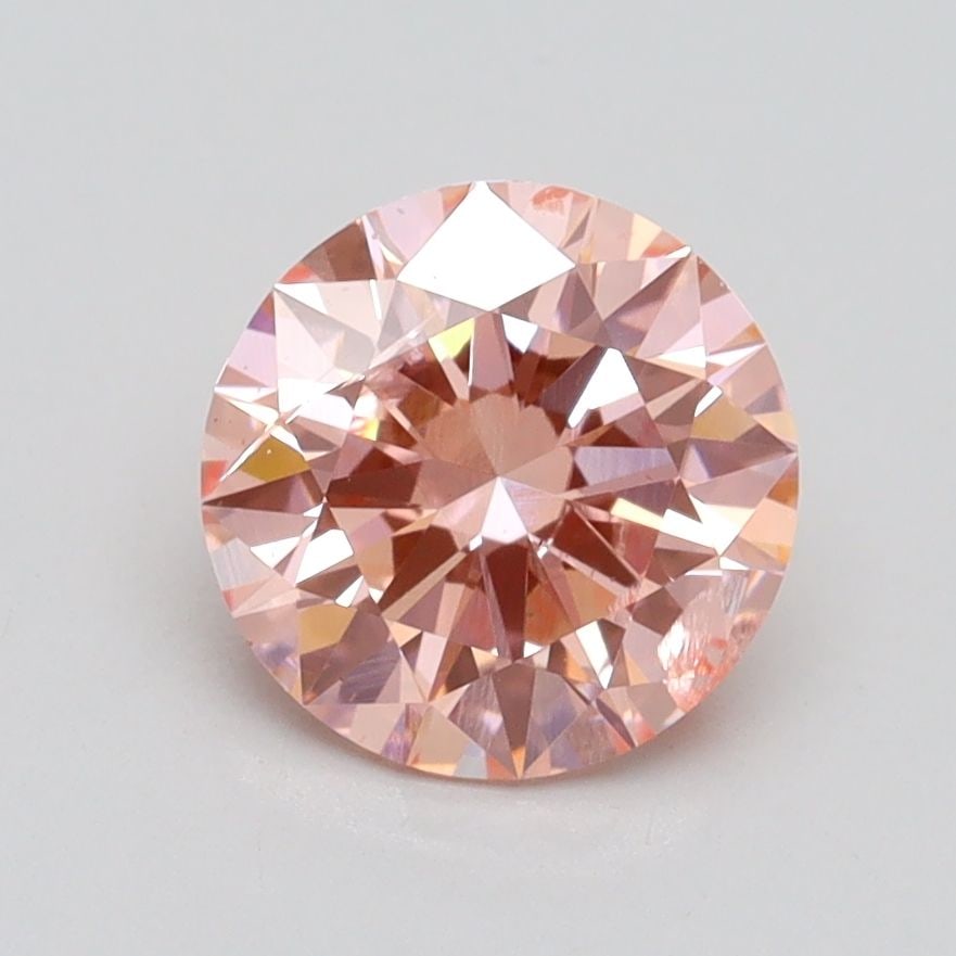 Loose Diamond - ROUND 1.52ct Fancy Intense Pink SI2: Loose Diamond - ROUND 1.52ct Fancy Intense Pink SI2 Source: This is a real non-mined Diamond that has been grown in a lab Shape: ROUND Carats: 1.52 Color: Fancy Intense Pink Certification: IGI Video: