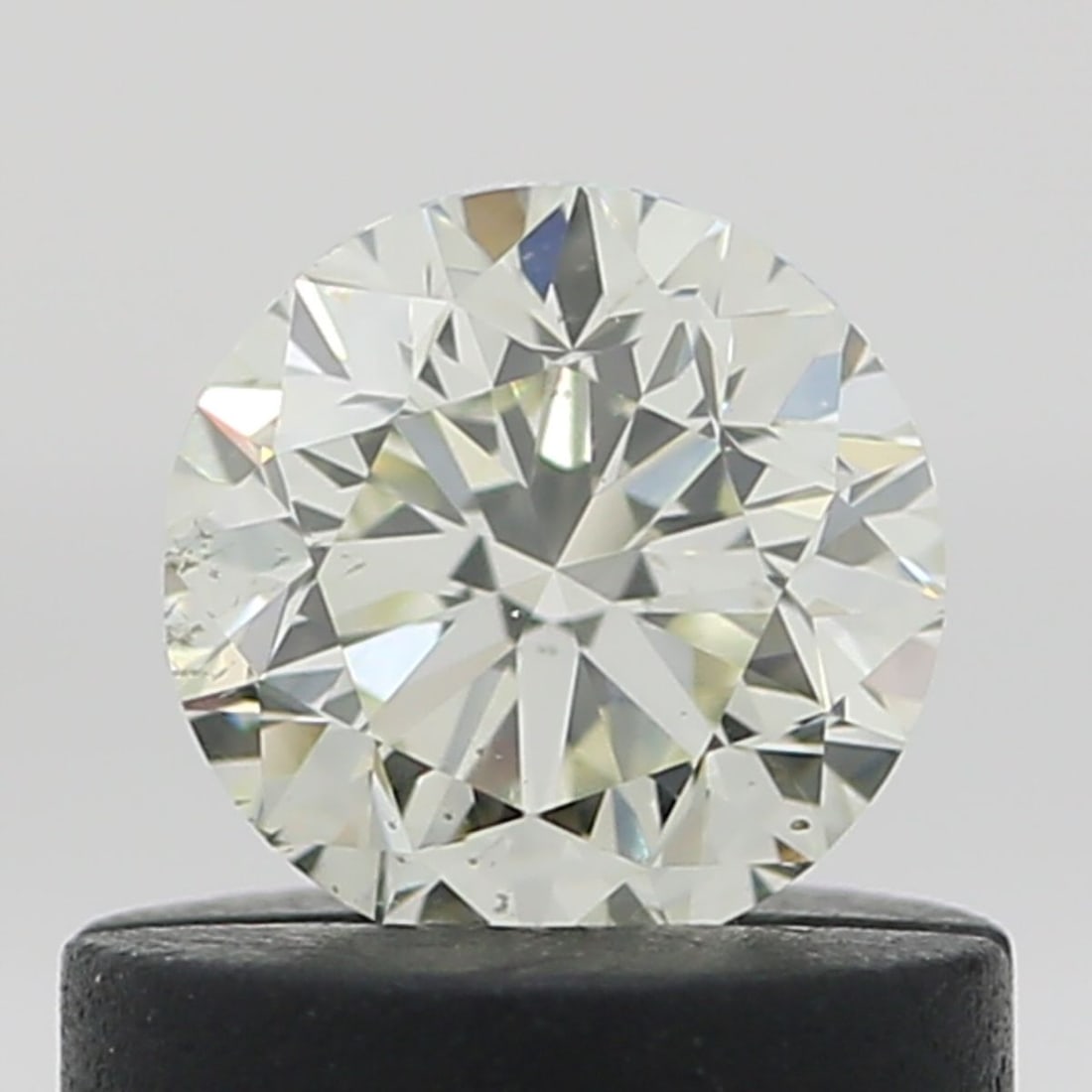 Loose Diamond - ROUND 0.5ct O-P SI2: Loose Diamond - ROUND 0.5ct O-P SI2 Source: Natural Shape: ROUND Carats: 0.5 Color: O-P Certification: NONE Video: