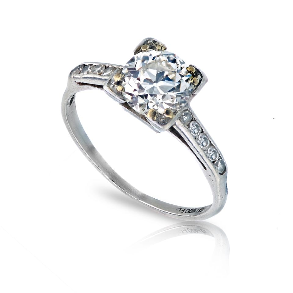 Vintage Platinum Engagement Ring 1 Carat Old European Cut Diamond: Vintage Platinum Engagement Ring 1 Carat Old European Cut Diamond This exquisite engagement ring features a stunning approximately 1 carat Old European Cut diamond as the centerpiece. The ring is ador