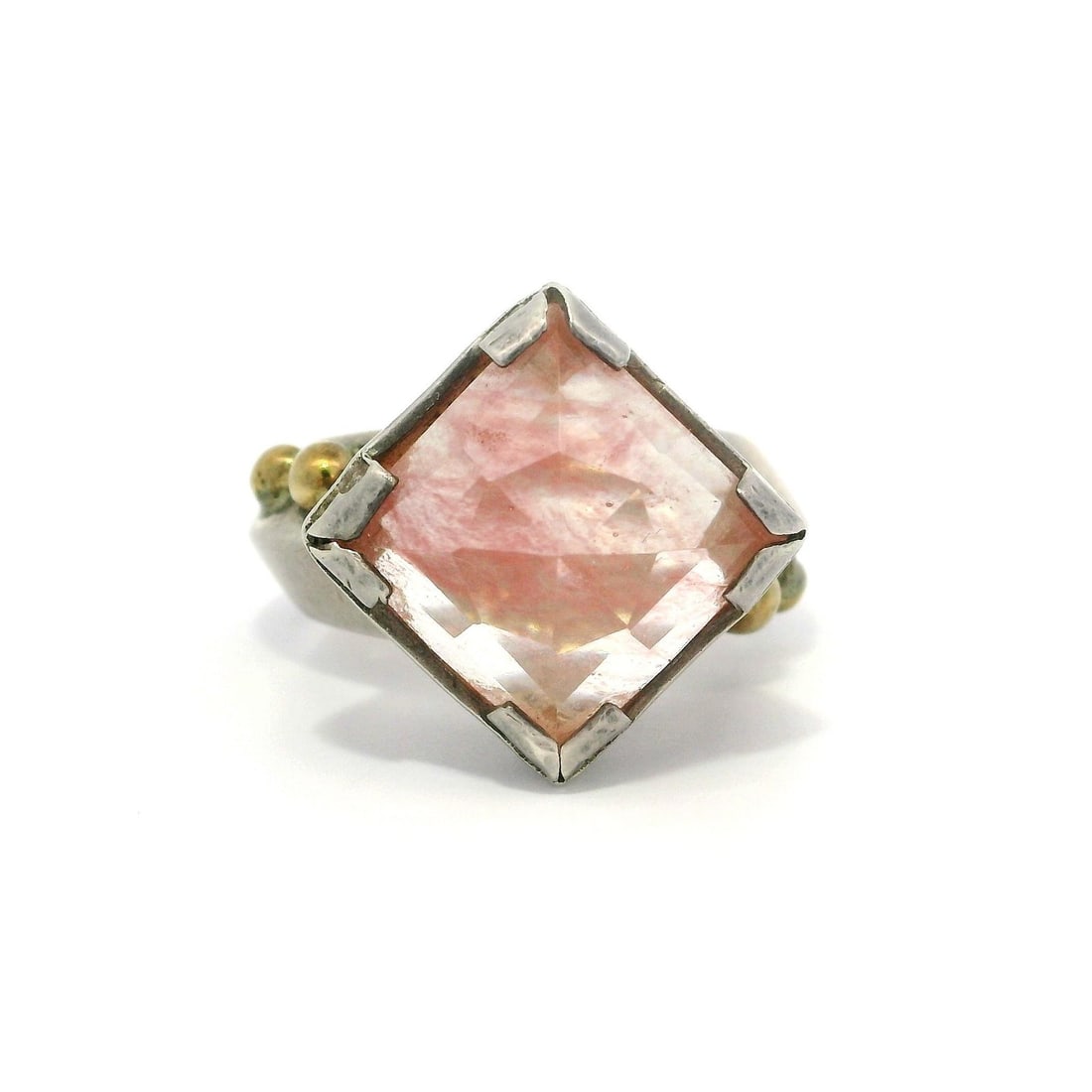 Handmade Sterling Silver Yellow Gold Rose Quartz Ring 7 Natural Pink Gemstone: Handmade Sterling Silver Yellow Gold Rose Quartz Ring 7 Natural Pink Gemstone This stunning Handmade Sterling Silver and Yellow Gold ring showcases a large natural rose quartz gemstone, beautifully cu