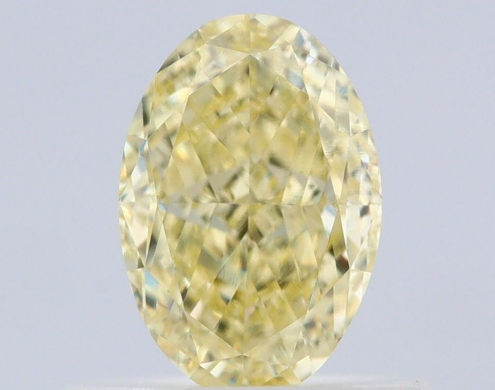 Loose Diamond - OVAL 0.64ct Fancy Yellow VVS2: Loose Diamond - OVAL 0.64ct Fancy Yellow VVS2 Source: Natural Shape: OVAL Carats: 0.64 Color: Fancy Yellow Certification: GIA Video: