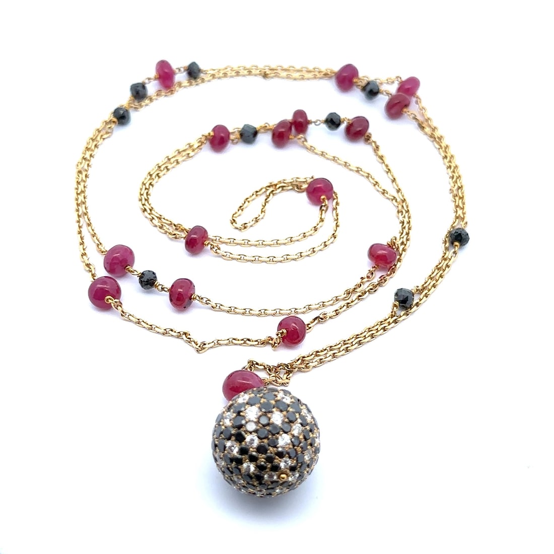 18k Gold Ruby & Diamond Beveled Cable Link Pendant 41": 18k Gold Ruby & Diamond Beveled Cable Link Pendant 41" This exquisite pendant features a stunning combination of natural rubies and diamonds set in solid 18k yellow gold. The pendant showcases 16 natu