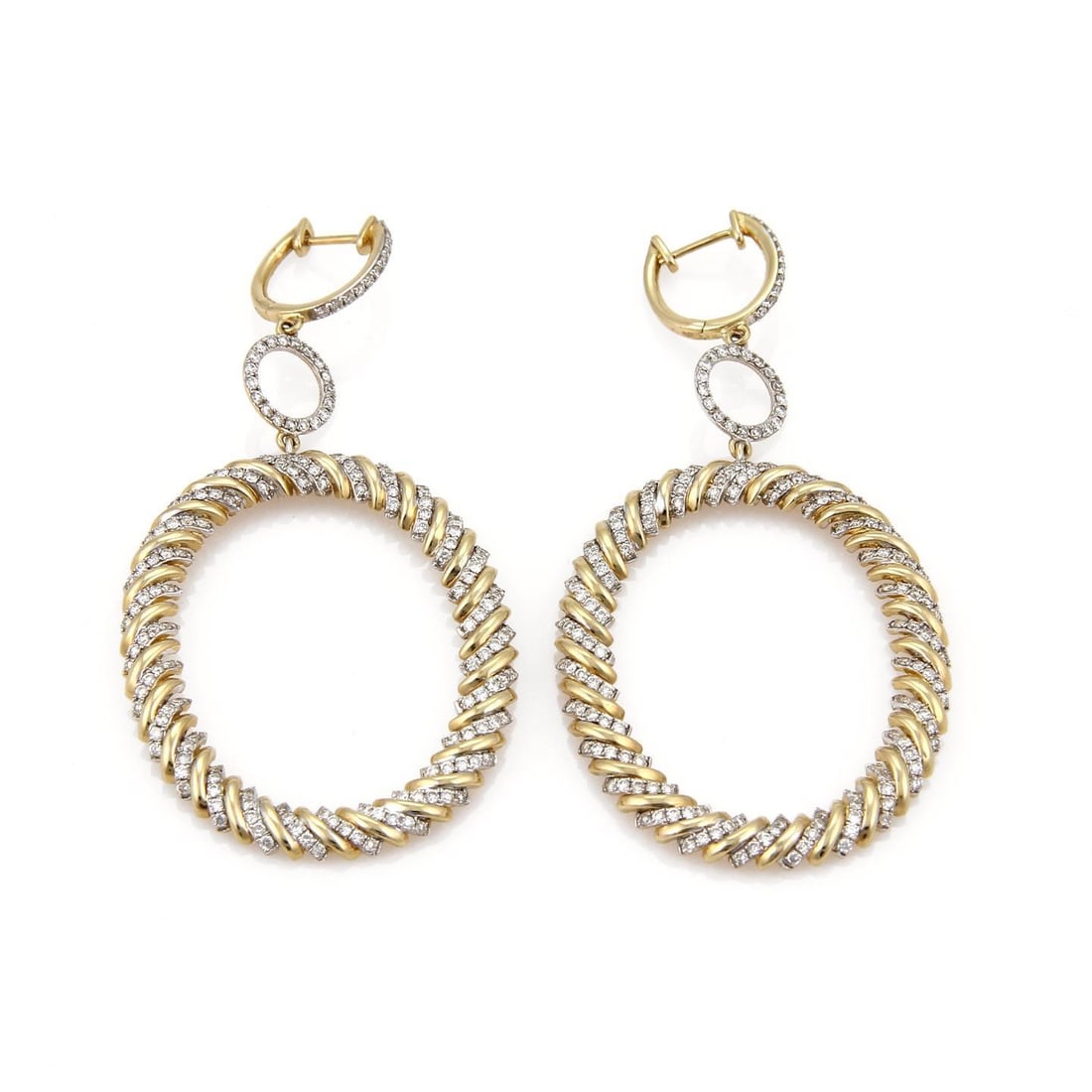 Elegant 2.00ct Diamond 14k Two Tone Gold Oval Hoop Earrings: Elegant 2.00ct Diamond 14k Two Tone Gold Oval Hoop Earrings These stunning modern earrings feature a unique design, elegantly crafted from 14k yellow and white gold with a high polished finish. The ea