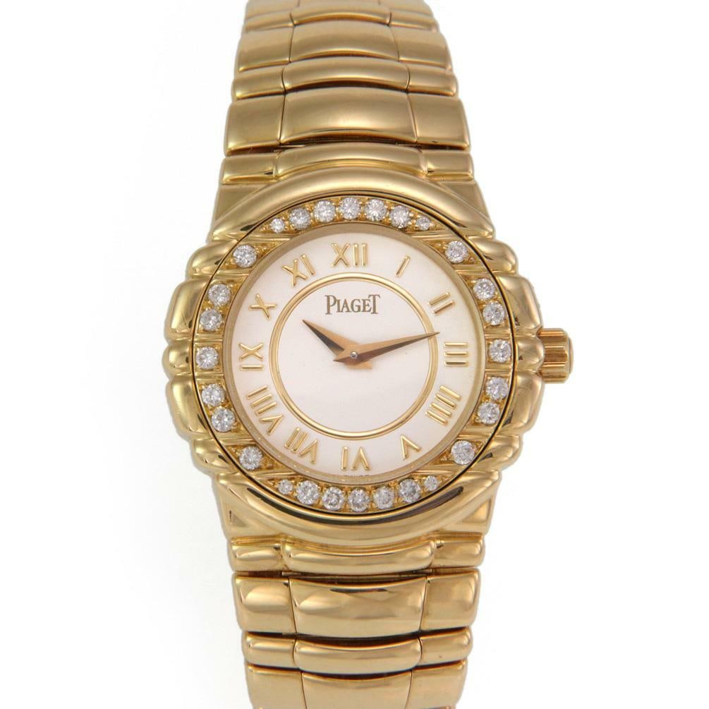 Piaget Tanagra 18k Gold Diamond Ladies Watch Quartz 16033: Piaget Tanagra 18k Gold Diamond Ladies Watch Quartz 16033 Introducing the exquisite Piaget Tanagra Diamond Ladies Quartz Watch, a stunning piece from the renowned TANAGRA collection. This sophisticate