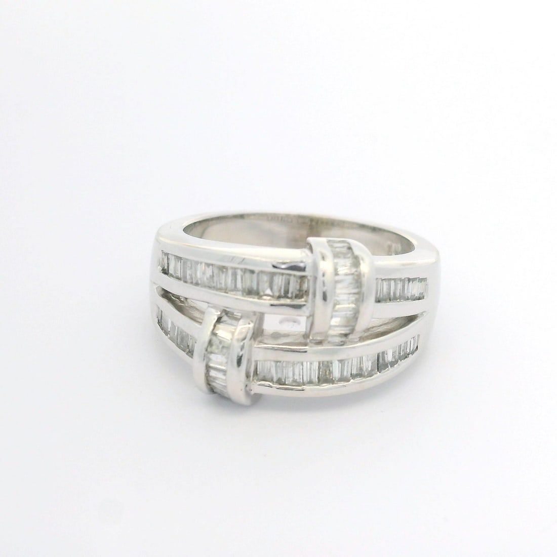 14k White Gold 1.00ctw Baguette Diamond Wide Band Ring: 14k White Gold 1.00ctw Baguette Diamond Wide Band Ring This stunning wide band ring is crafted from solid 14k white gold and features a total carat weight of approximately 1.00ctw. It showcases a beau