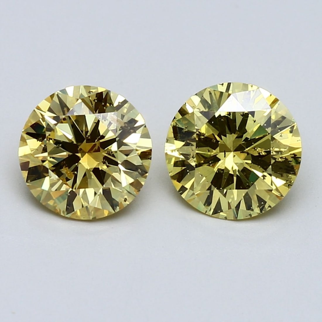 Loose Diamond - ROUND 1.54ct Fancy Vivid Yellow I1: Loose Diamond - ROUND 1.54ct Fancy Vivid Yellow I1 Source: Natural Shape: ROUND Carats: 1.54 Color: Fancy Vivid Yellow Certification: GIA Video: