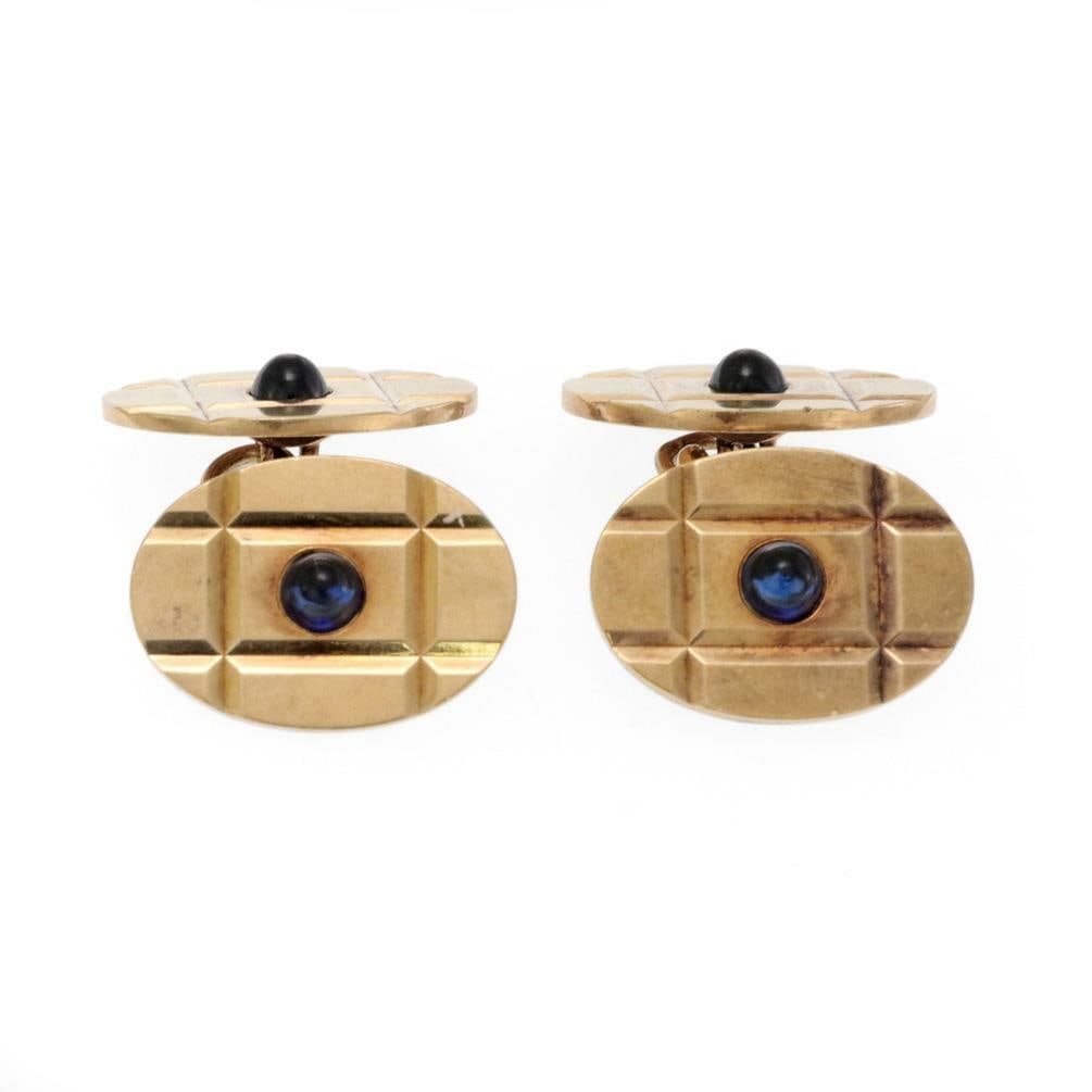 Tiffany & Co Vintage 14k Gold 1.20ct Sapphire Oval Cufflinks: Tiffany & Co Vintage 14k Gold 1.20ct Sapphire Oval Cufflinks Presenting an exquisite pair of vintage cufflinks from Tiffany & Co., expertly crafted from 14k yellow gold. These cufflinks feature a soph