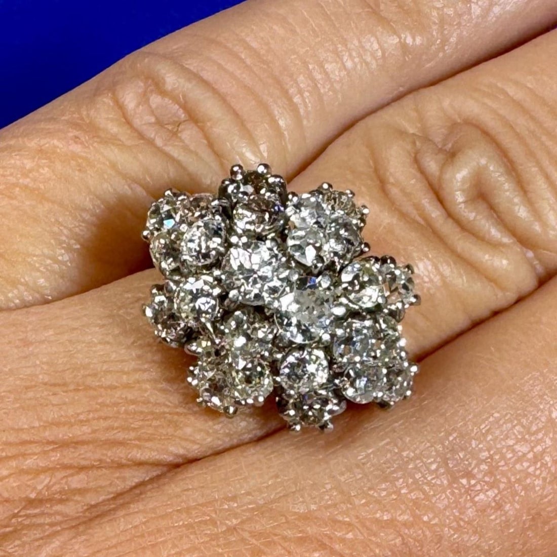1950's Platinum Ring with 4.00 Ct Old Mine Diamonds: 1950's Platinum Ring with 4.00 Ct Old Mine Diamonds This exquisite 1950's platinum diamond ring features a stunning total of 4.00 carats, elegantly set with 26 Old Mine diamonds. The diamonds showcase