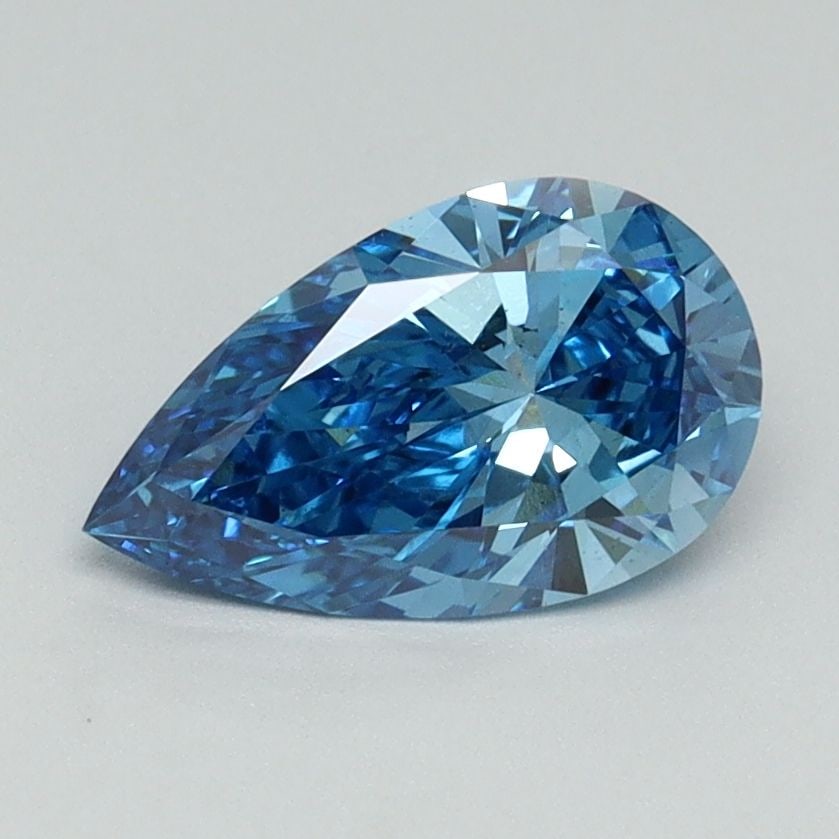 Loose Diamond - PEAR 1.0ct Fancy Vivid Blue VS1: Loose Diamond - PEAR 1.0ct Fancy Vivid Blue VS1 Source: This is a real non-mined Diamond that has been grown in a lab Shape: PEAR Carats: 1.0 Color: Fancy Vivid Blue Certification: IGI Video:
