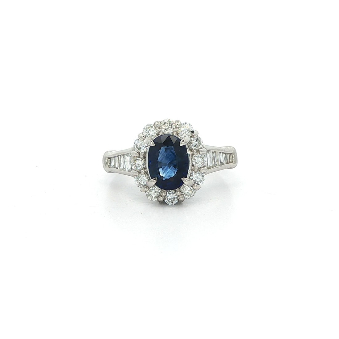 Platinum GIA Certified 1.8ct Royal Blue Sapphire Diamond Ring: Platinum GIA Certified 1.8ct Royal Blue Sapphire Diamond Ring This exquisite engagement ring features a stunning natural oval brilliant cut royal blue sapphire, expertly prong set and weighing 1.16 ct