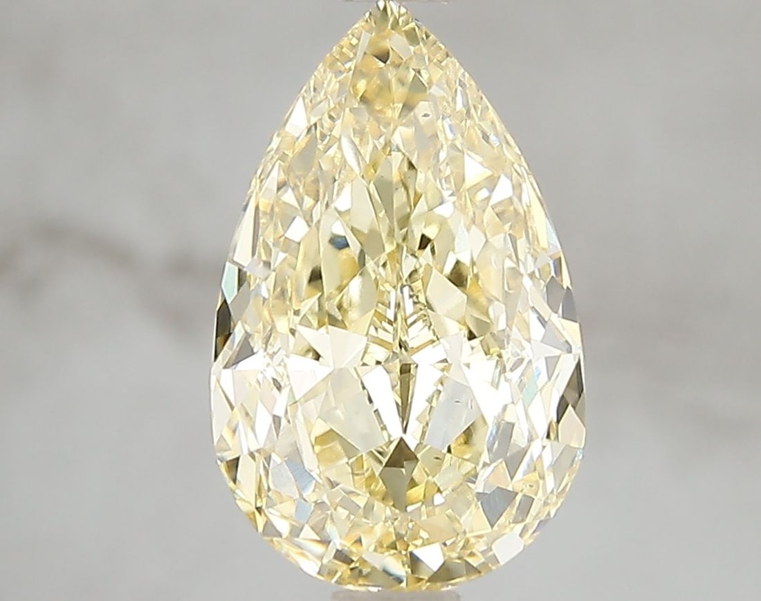 Loose Diamond - PEAR 3.02ct Fancy Intense Yellow VS2: Loose Diamond - PEAR 3.02ct Fancy Intense Yellow VS2 Source: This is a real non-mined Diamond that has been grown in a lab Shape: PEAR Carats: 3.02 Color: Fancy Intense Yellow Certification: IGI Video