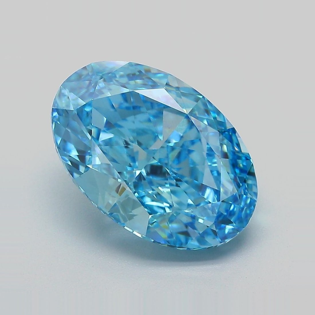 Loose Diamond - OVAL 6.64ct Fancy Vivid Blue VVS2: Loose Diamond - OVAL 6.64ct Fancy Vivid Blue VVS2 Source: This is a real non-mined Diamond that has been grown in a lab Shape: OVAL Carats: 6.64 Color: Fancy Vivid Blue Certification: IGI Video:
