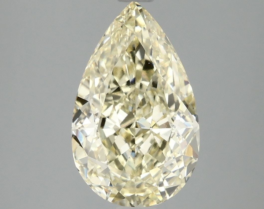 Loose Diamond - PEAR 3.1ct Fancy Yellow VS1: Loose Diamond - PEAR 3.1ct Fancy Yellow VS1 Source: This is a real non-mined Diamond that has been grown in a lab Shape: PEAR Carats: 3.1 Color: Fancy Yellow Certification: IGI Video: