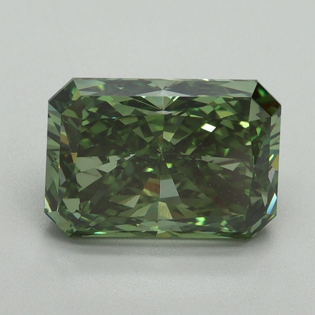 Loose Diamond - RADIANT 3.14ct Fancy Vivid Green VS1: Loose Diamond - RADIANT 3.14ct Fancy Vivid Green VS1 Source: This is a real non-mined Diamond that has been grown in a lab Shape: RADIANT Carats: 3.14 Color: Fancy Vivid Green Certification: IGI Video