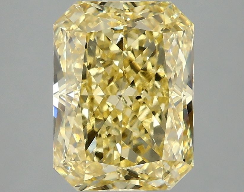 Loose Diamond - RADIANT 3.1ct Fancy Vivid Yellow VS1: Loose Diamond - RADIANT 3.1ct Fancy Vivid Yellow VS1 Source: This is a real non-mined Diamond that has been grown in a lab Shape: RADIANT Carats: 3.1 Color: Fancy Vivid Yellow Certification: IGI Video