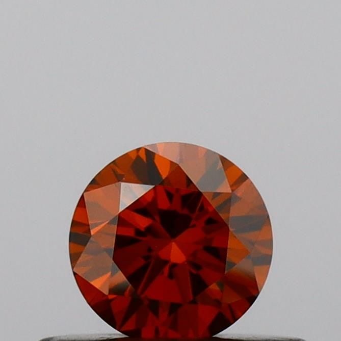 Loose Diamond - ROUND 0.29ct Fancy Deep Orange VS1: Loose Diamond - ROUND 0.29ct Fancy Deep Orange VS1 Source: This is a real non-mined Diamond that has been grown in a lab Shape: ROUND Carats: 0.29 Color: Fancy Deep Orange Certification: IGI Video: