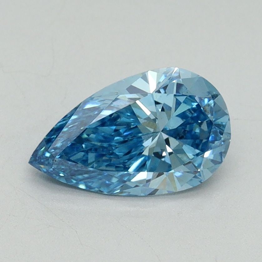Loose Diamond - PEAR 1.0ct Fancy Vivid Blue VS1: Loose Diamond - PEAR 1.0ct Fancy Vivid Blue VS1 Source: This is a real non-mined Diamond that has been grown in a lab Shape: PEAR Carats: 1.0 Color: Fancy Vivid Blue Certification: IGI Video:
