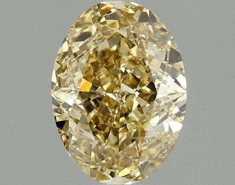 Loose Diamond - OVAL 2.08ct Fancy Vivid Yellow VS1: Loose Diamond - OVAL 2.08ct Fancy Vivid Yellow VS1 Source: This is a real non-mined Diamond that has been grown in a lab Shape: OVAL Carats: 2.08 Color: Fancy Vivid Yellow Certification: IGI Video: