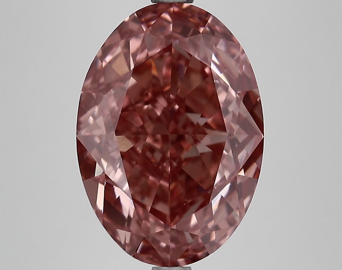 Loose Diamond - OVAL 6.62ct Fancy Vivid Pink VVS2: Loose Diamond - OVAL 6.62ct Fancy Vivid Pink VVS2 Source: This is a real non-mined Diamond that has been grown in a lab Shape: OVAL Carats: 6.62 Color: Fancy Vivid Pink Certification: IGI Video: