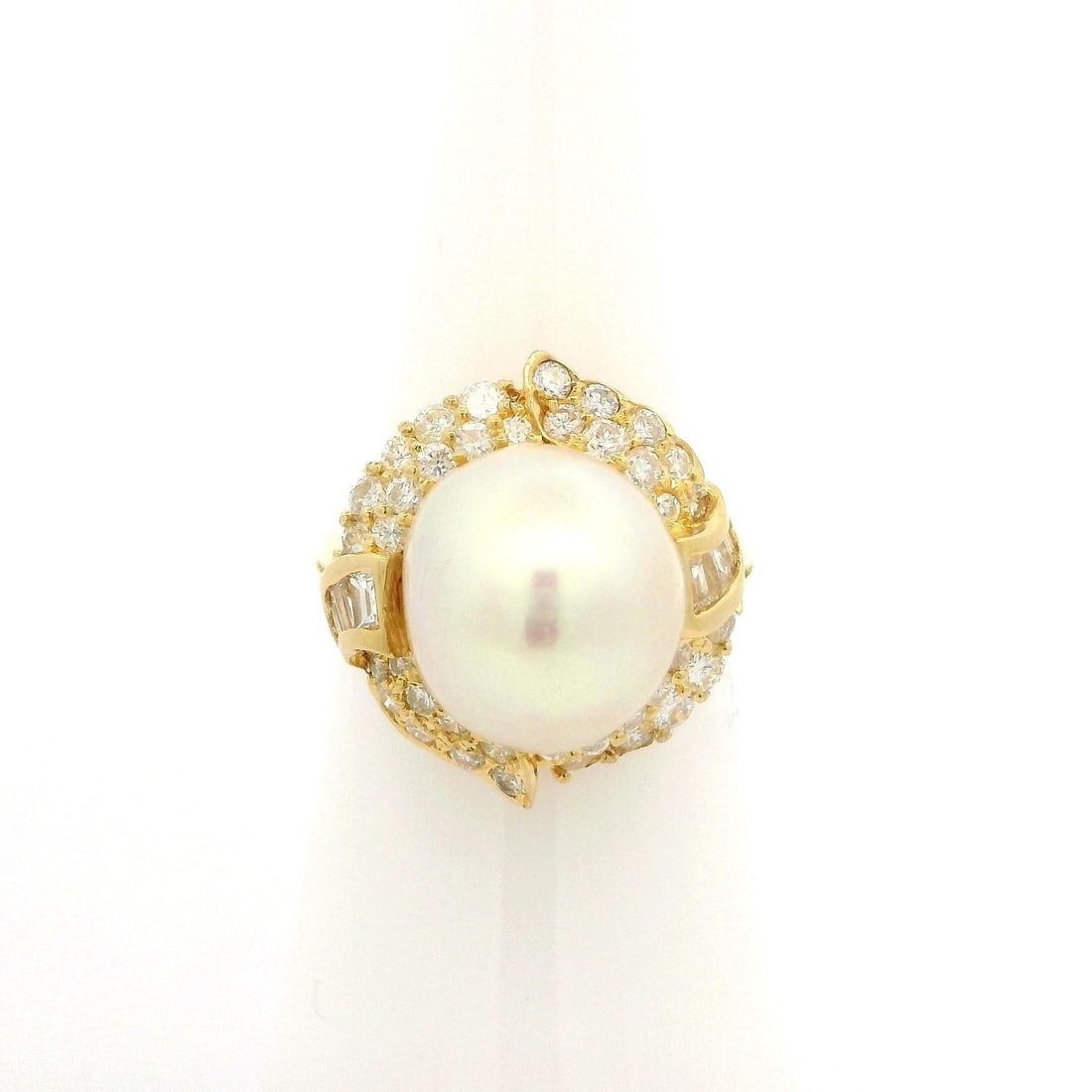 18k Yellow Gold Pearl Diamond Halo Cocktail Ring 0.70ctw: 18k Yellow Gold Pearl Diamond Halo Cocktail Ring 0.70ctw This exquisite cocktail ring features a stunning natural cultured pearl at its center, measuring approximately 11.9x10.7mm with a captivating w