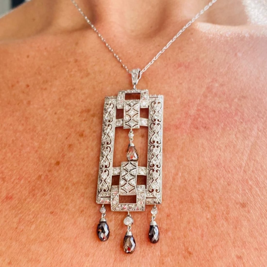 Art Deco Platinum Pendant with 4 Brown Briolette Diamonds 6.25 Ct: Art Deco Platinum Pendant with 4 Brown Briolette Diamonds 6.25 Ct This exquisite Art Deco Platinum Diamond Pendant and Chain showcases a stunning design, weighing 15.5 grams. The pendant features 4 Br
