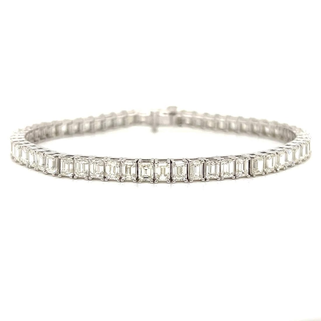 Elegant 14K White Gold 11.05 Ct Diamond Tennis Bracelet with 60 Baguette Diamonds: Elegant 14K White Gold 11.05 Ct Diamond Tennis Bracelet with 60 Baguette Diamonds This stunning 14K White Gold Diamond Tennis Bracelet features 60 exquisite Baguette Diamonds, collectively weighing ap