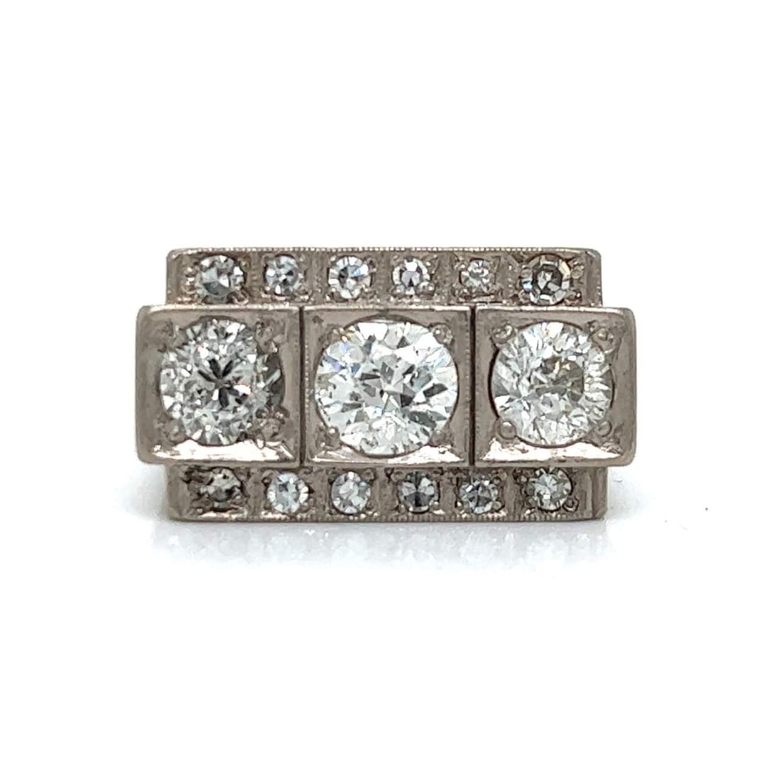 Art Deco Platinum Ring with 2.90 Ct Diamonds: Art Deco Platinum Ring with 2.90 Ct Diamonds This exquisite Art Deco ring showcases a stunning arrangement of diamonds set in luxurious platinum. The centerpiece features an approximate 1.20 Ct. diamo