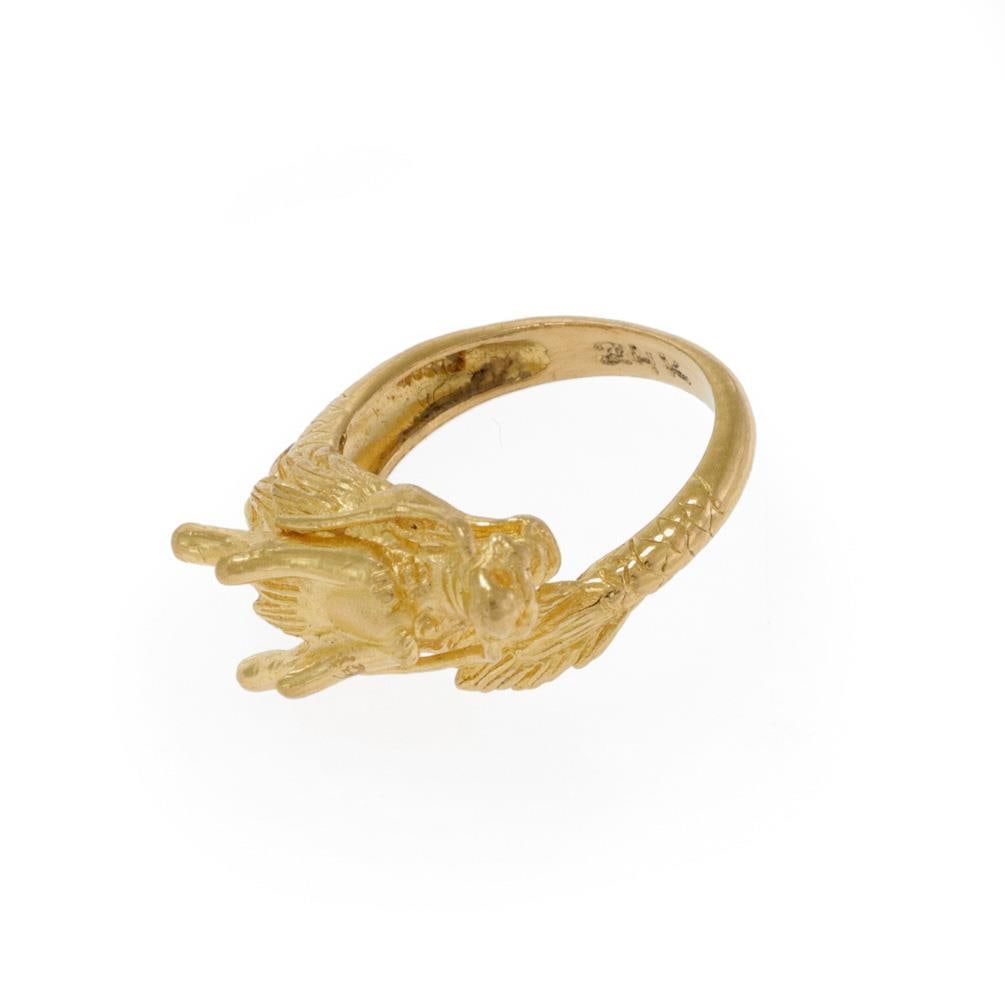 24k Yellow Gold Dragon Bypass Ring Size 8 Unique Design: 24k Yellow Gold Dragon Bypass Ring Size 8 Unique Design This exquisite ring showcases a detailed sculpted design, crafted from fine 24k yellow gold. It features an impressively carved dragon head with