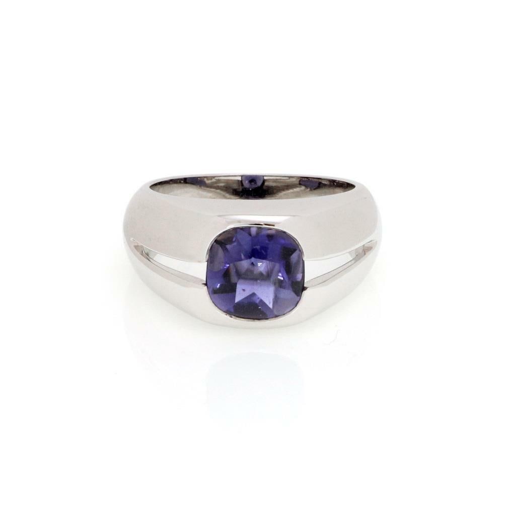 Tiffany & Co. 18k White Gold Iolite Cushion Ring: Tiffany & Co. 18k White Gold Iolite Cushion Ring This exquisite Tiffany & Co. solitaire ring features a stunning cushion-shaped iolite gemstone, measuring 8mm x 8mm, beautifully set in a unique open d