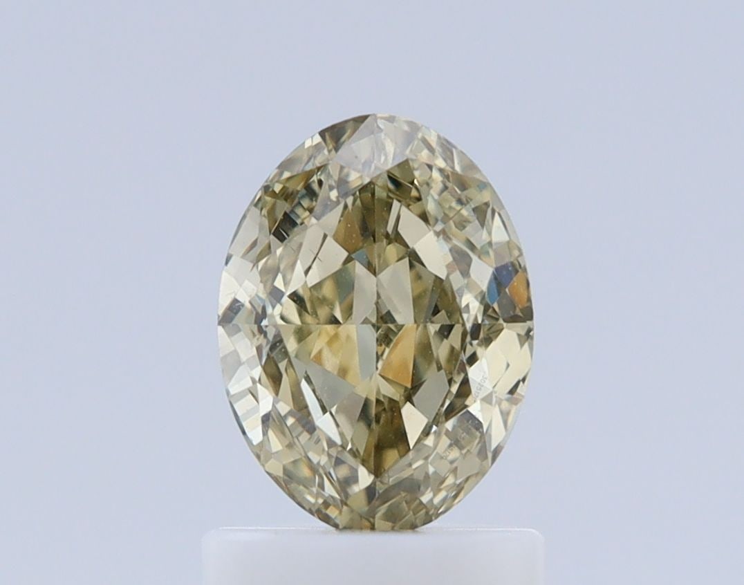Loose Diamond - OVAL 1.01ct Fancy Brownish Greenish Yellow VS2: Loose Diamond - OVAL 1.01ct Fancy Brownish Greenish Yellow VS2 Source: Natural Shape: OVAL Carats: 1.01 Color: Fancy Brownish Greenish Yellow Certification: GIA Video: