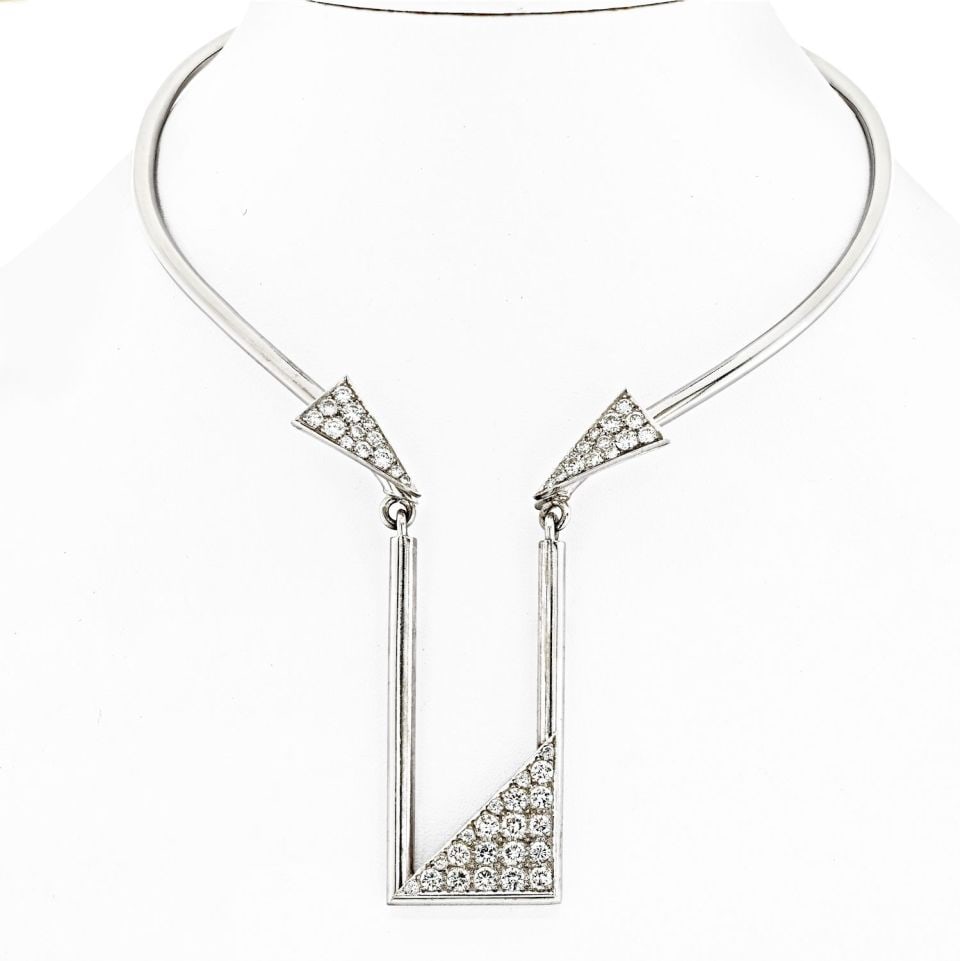 14K White Gold Geometrical Collar Necklace with 5.5 Carats Diamonds: 14K White Gold Geometrical Collar Necklace with 5.5 Carats Diamonds This stunning collar necklace is crafted from 14K white gold, offering a sleek and modern design that beautifully accentuates the ne