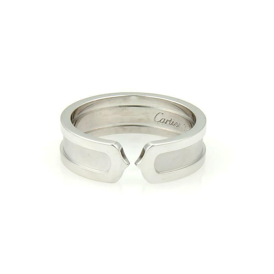 Cartier Double C 18k White Gold Cuff Ring 6.5mm Size 53 with Certificate: Cartier Double C 18k White Gold Cuff Ring 6.5mm Size 53 with Certificate This exquisite wide band ring is an authentic piece by Cartier from the Double C collection, crafted from 18k white gold. It sh