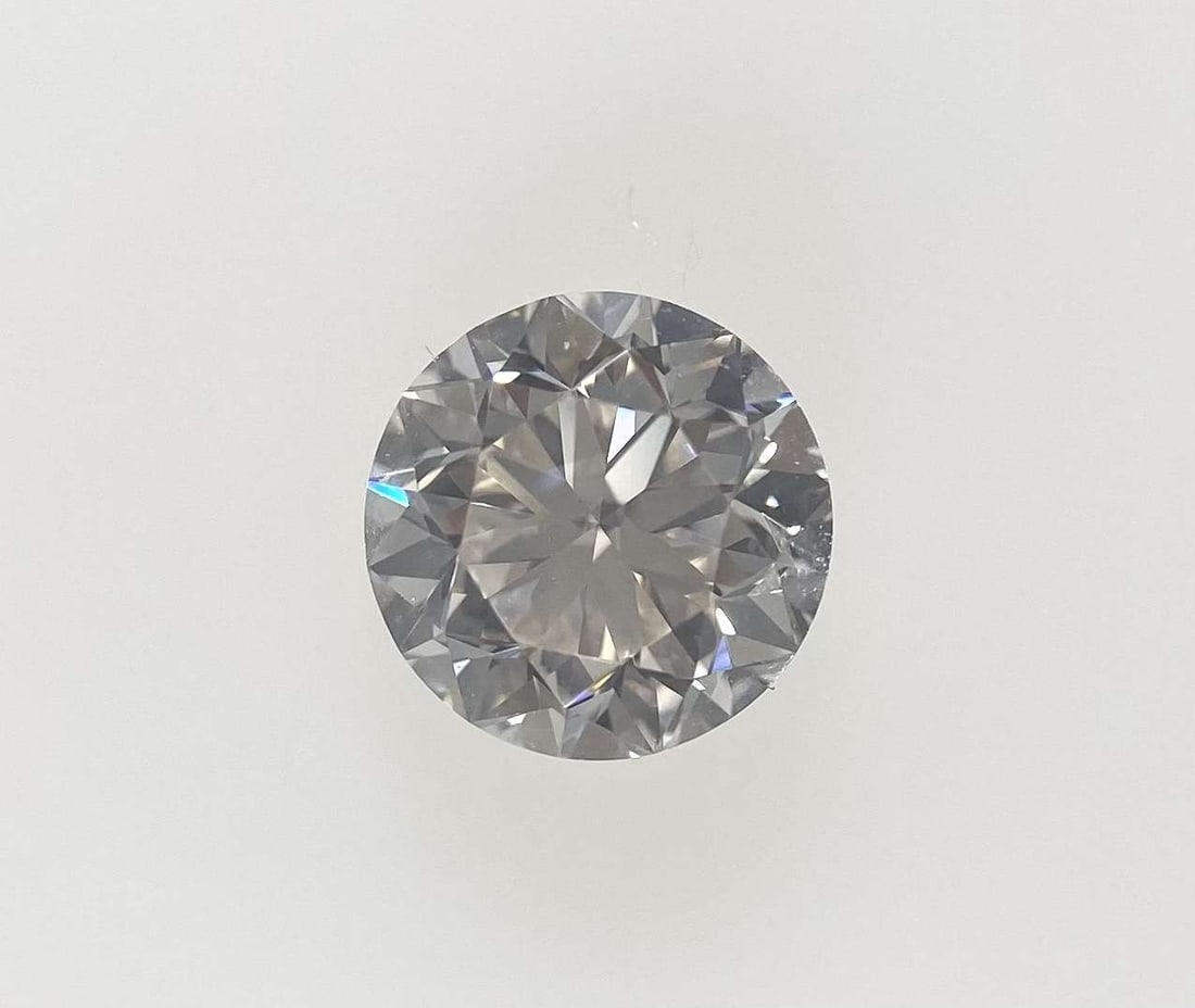 Loose Diamond - ROUND 1.03ct Very Light Pinkish Brown VS1: Loose Diamond - ROUND 1.03ct Very Light Pinkish Brown VS1 Source: Natural Shape: ROUND Carats: 1.03 Color: Very Light Pinkish Brown Certification: GIA The Diamond Depot Guarantee: All items in this au