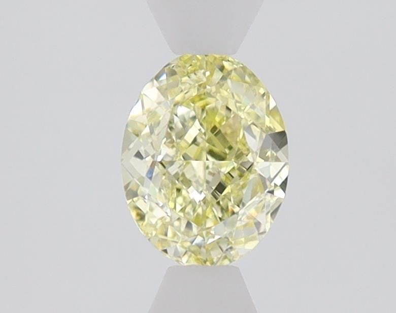 Loose Diamond - OVAL 0.72ct Fancy Yellow SI1: Loose Diamond - OVAL 0.72ct Fancy Yellow SI1 Source: Natural Shape: OVAL Carats: 0.72 Color: Fancy Yellow Certification: GIA The Diamond Depot Guarantee: All items in this auction are guaranteed to be