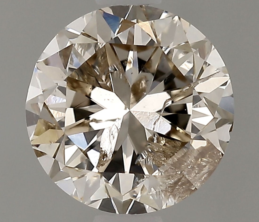 Loose Diamond - ROUND 1.01ct O-P I2: Loose Diamond - ROUND 1.01ct O-P I2 Source: Natural Shape: ROUND Carats: 1.01 Color: O-P Certification: NONE Video: