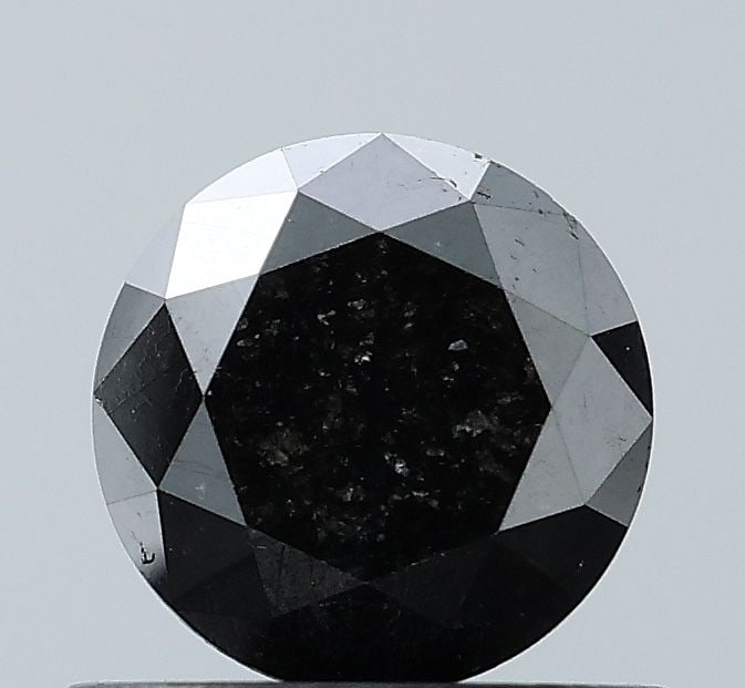 Loose Diamond - ROUND 0.81ct Fancy Black VS1: Loose Diamond - ROUND 0.81ct Fancy Black VS1 Source: Natural Shape: ROUND Carats: 0.81 Color: Fancy Black Certification: NONE Video: