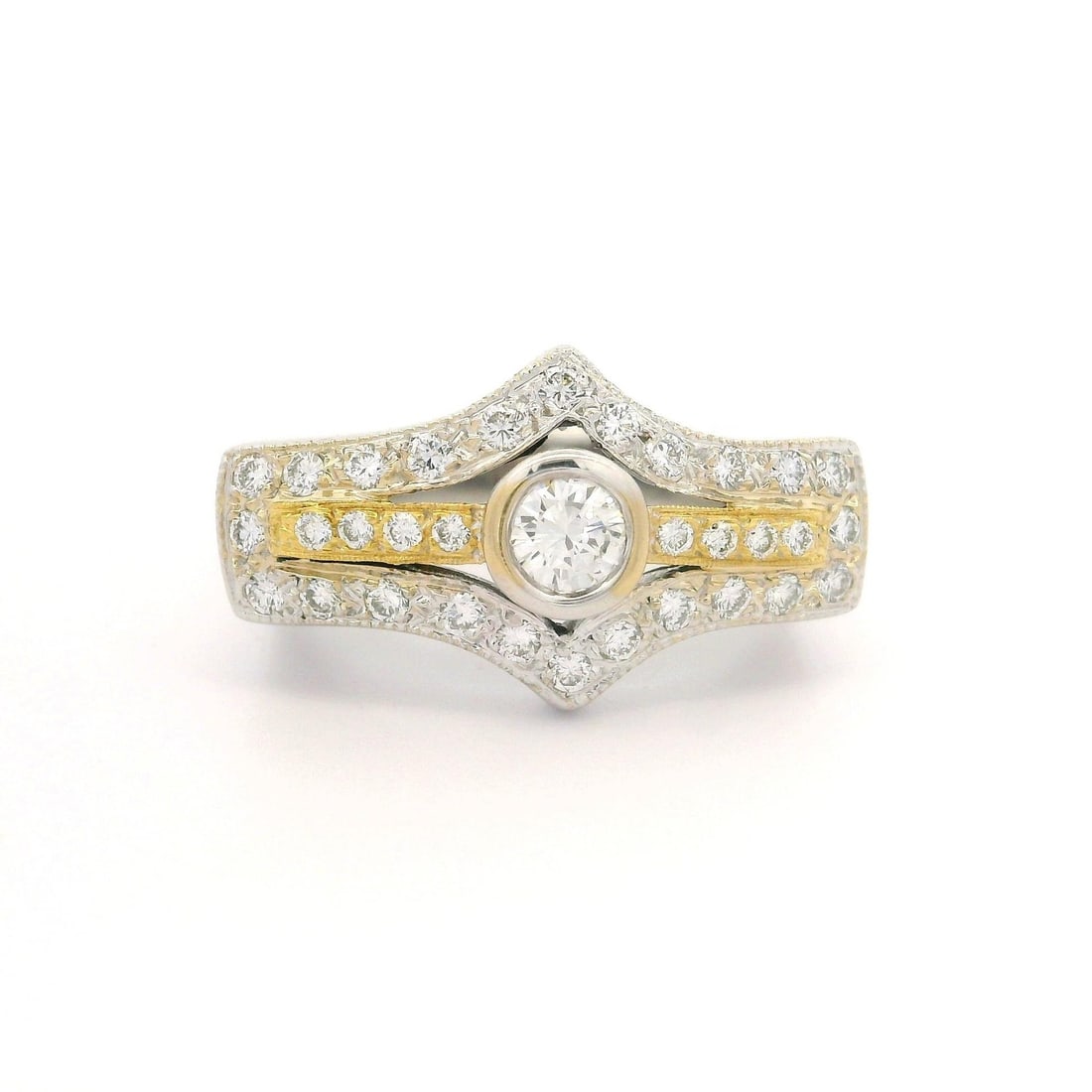 18k Two Tone Gold 0.64ct Diamond East West Cocktail Ring: 18k Two Tone Gold 0.64ct Diamond East West Cocktail Ring This exquisite cocktail ring features a stunning combination of 18k two-tone gold and a dazzling array of diamonds. The ring is designed in an