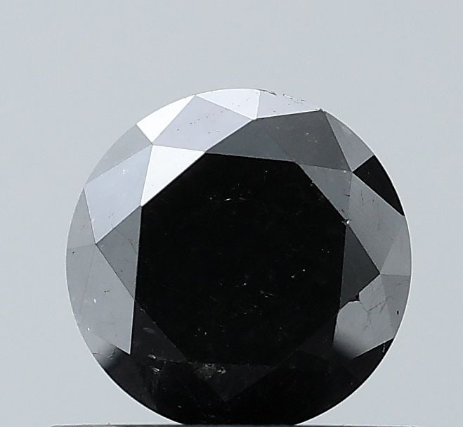 Loose Diamond - ROUND 0.78ct Fancy Black VS1: Loose Diamond - ROUND 0.78ct Fancy Black VS1 Source: Natural Shape: ROUND Carats: 0.78 Color: Fancy Black Certification: NONE Video: