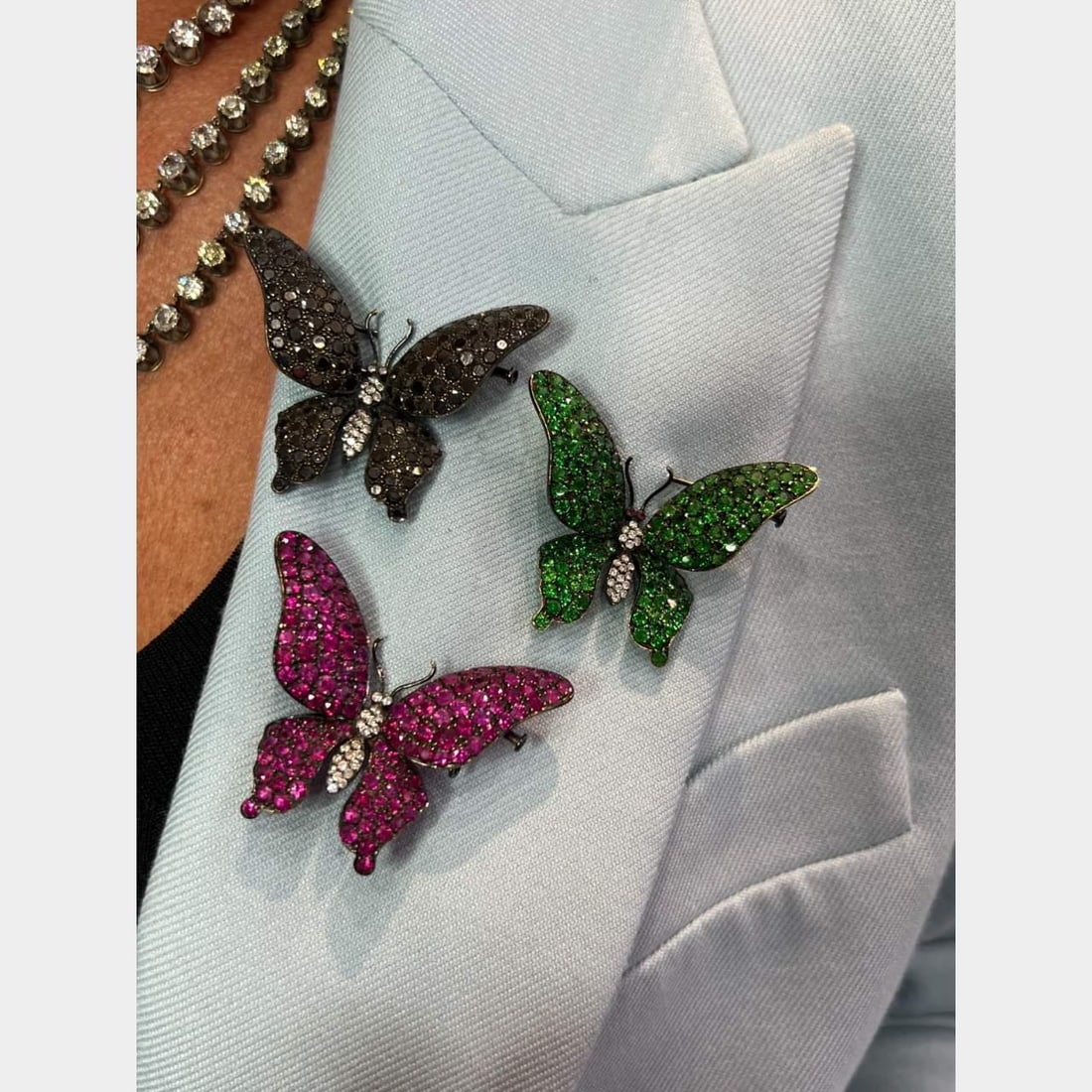 Alopa 18K White Gold Butterfly Brooch with 134 Burma Rubies and 22 Diamonds: Alopa 18K White Gold Butterfly Brooch with 134 Burma Rubies and 22 Diamonds This exquisite butterfly brooch is crafted from 18K white gold and features a stunning array of 134 Burma rubies totaling ap