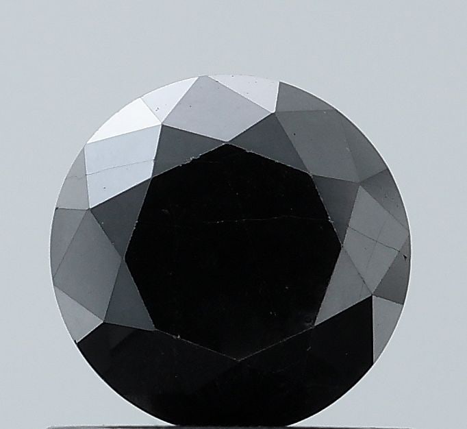 Loose Diamond - ROUND 0.94ct Fancy Black VVS2: Loose Diamond - ROUND 0.94ct Fancy Black VVS2 Source: Natural Shape: ROUND Carats: 0.94 Color: Fancy Black Certification: NONE Video: